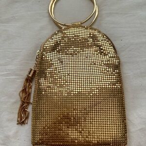 Wristlet gold bag